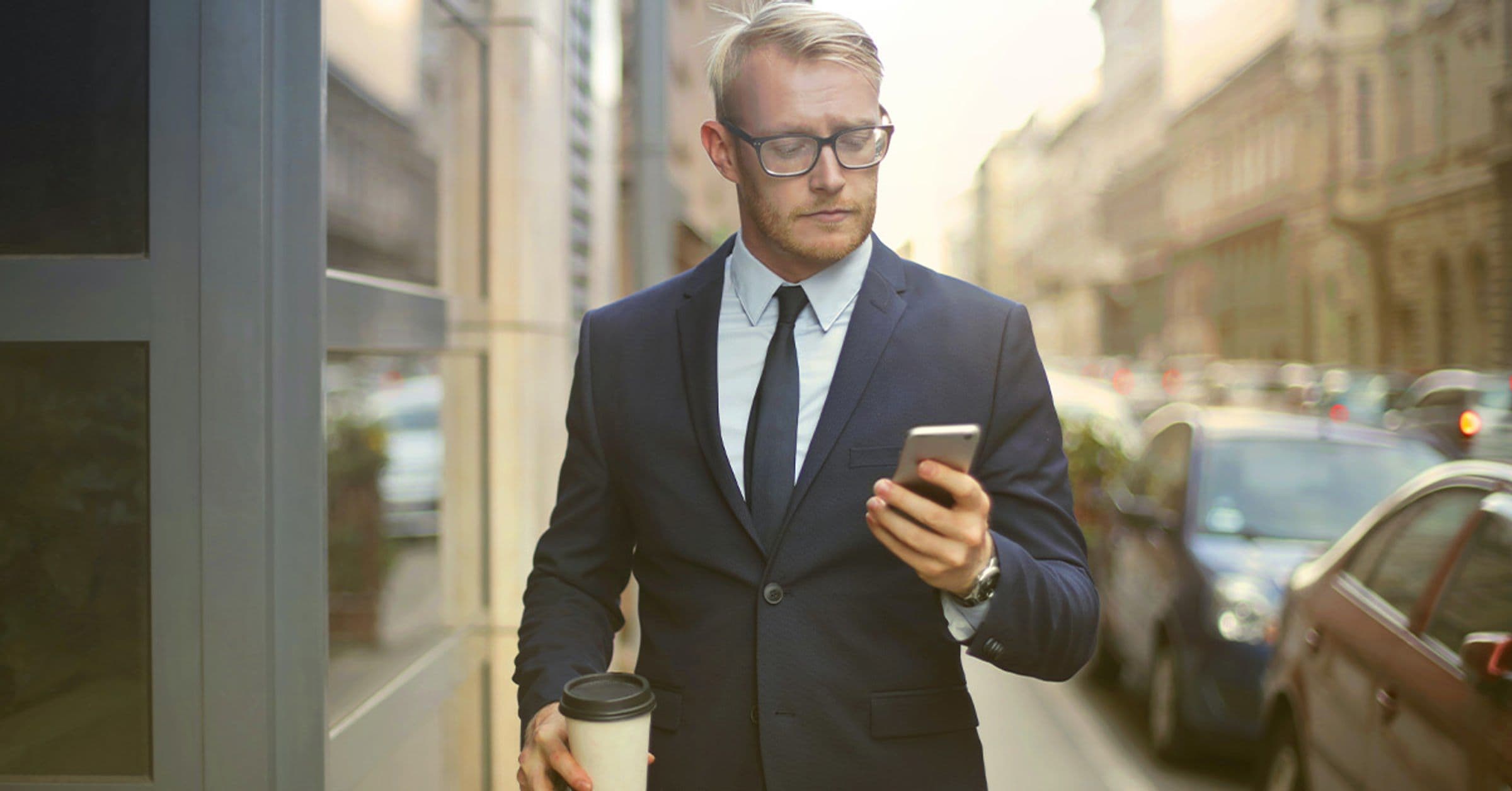 Office worker checking phone