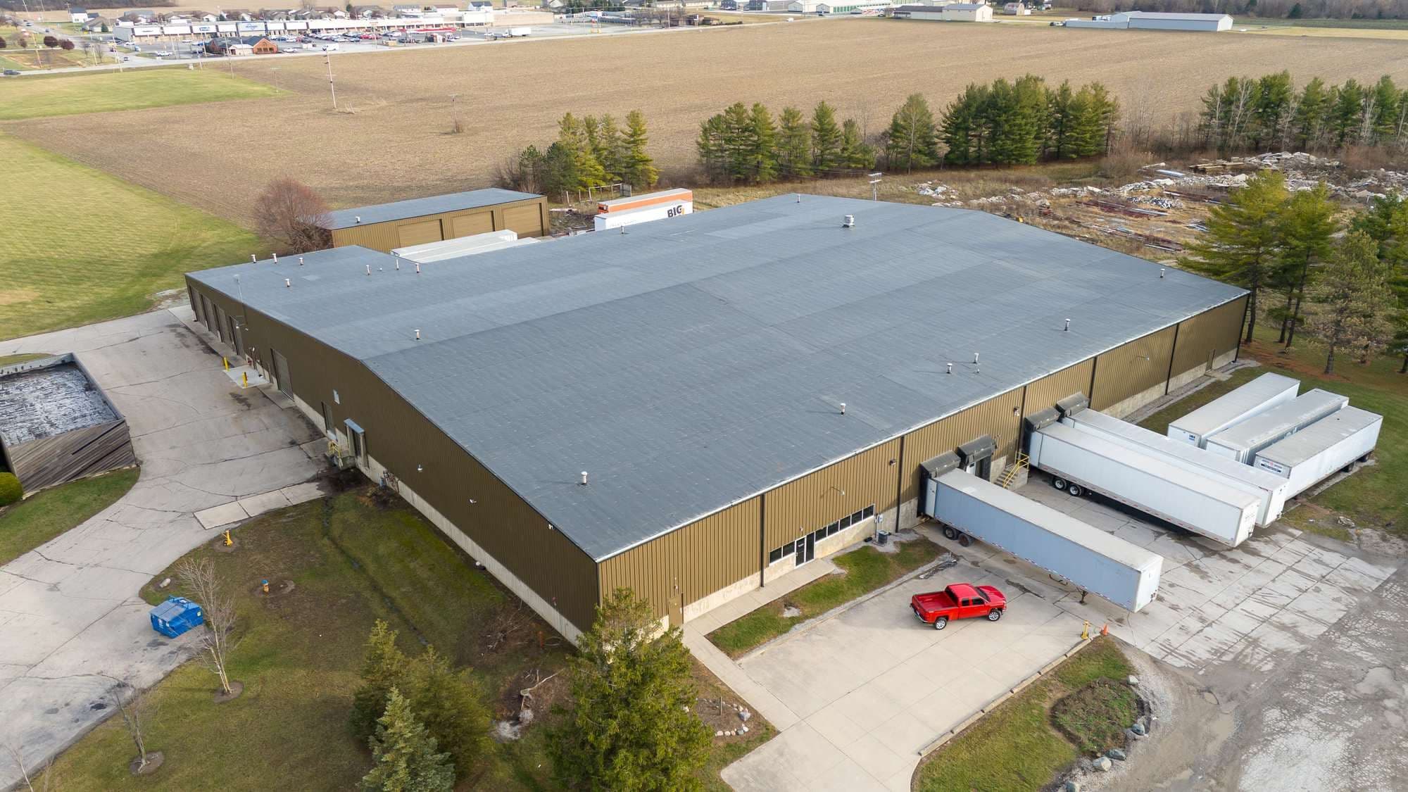 Aerial view of the Bluffton warehouse dock side with trailers staged at the loading doors