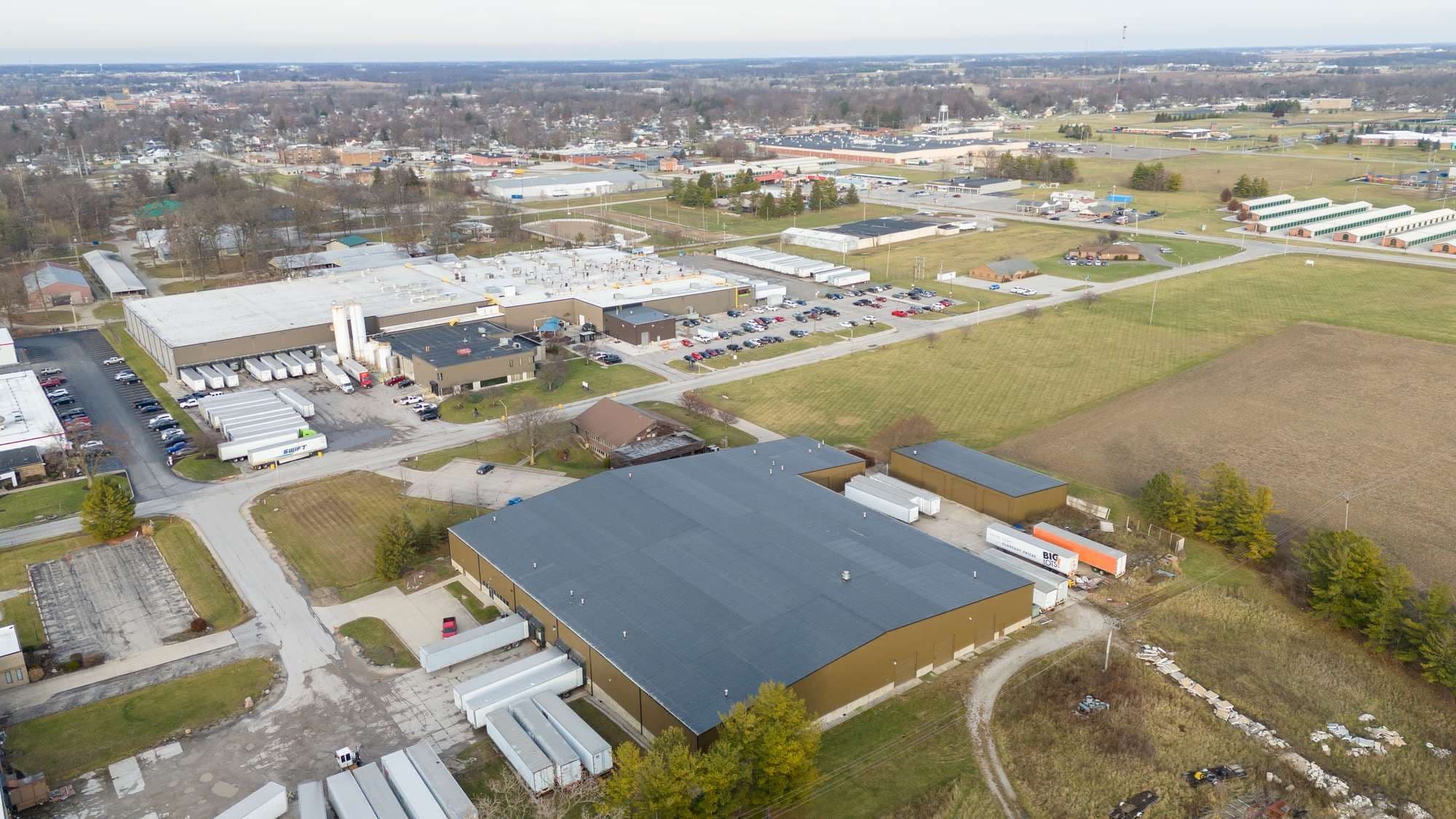 Wide aerial of the Bluffton warehouse within the surrounding industrial corridor